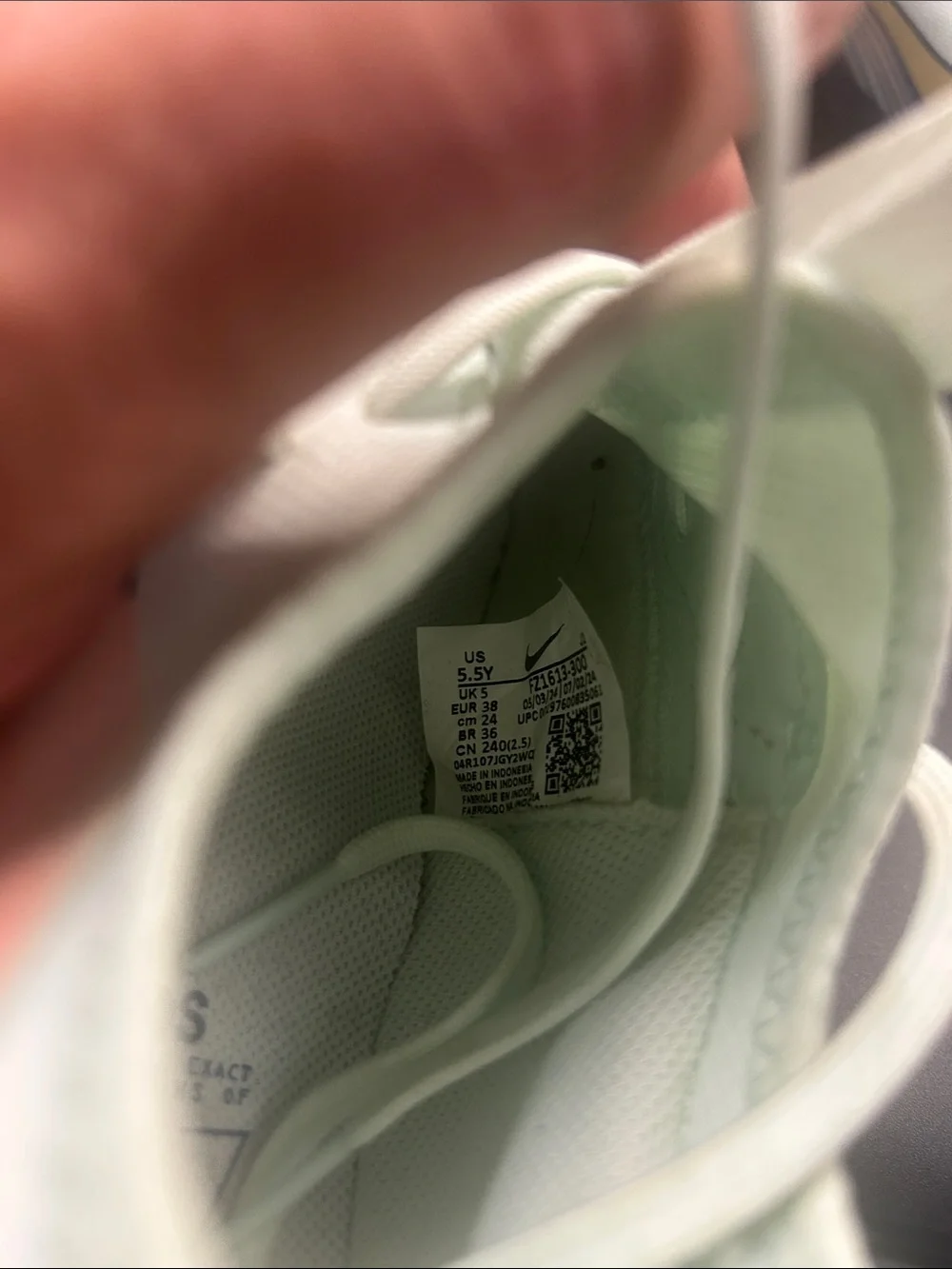 Nike Air Zoom Light Mint Soccer Shoes with Yellow Swoosh and Pastel Heel Accents